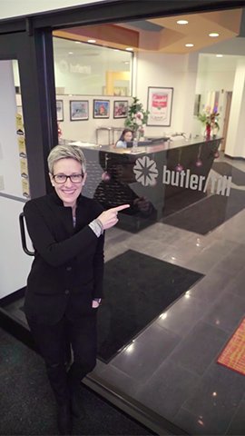 Amanda DeVito standing outside of her office.